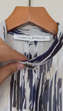 Cargar y reproducir el video en el visor de la galería, Camisa Flans